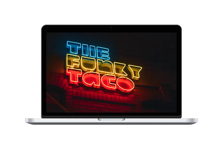 laptop con fondo de pantalla de letras neón en tubo de vidrio